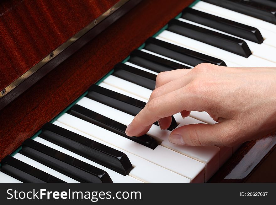 Adult Hand on Piano